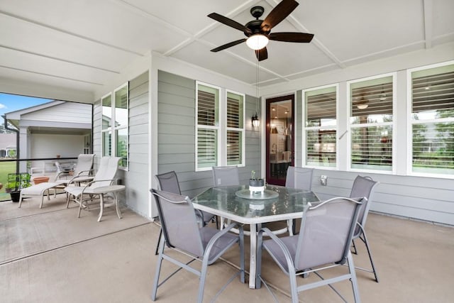 view of patio featuring ceiling fan