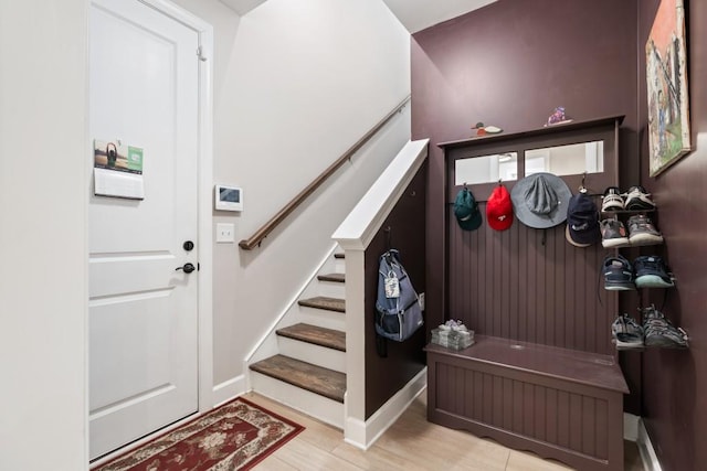 foyer with light hardwood / wood-style floors