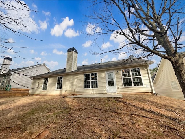 back of house featuring a patio