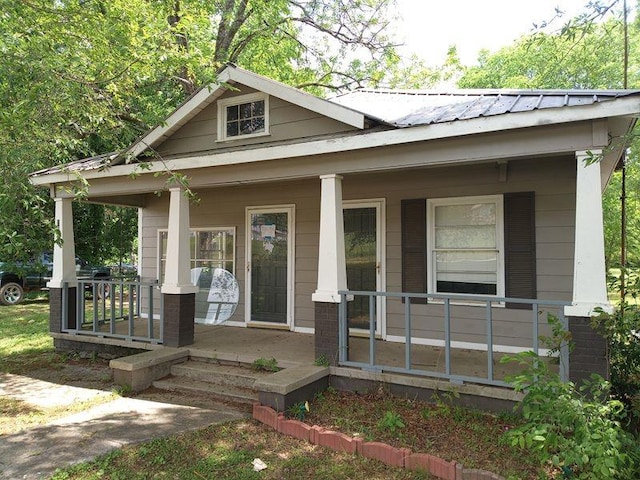 2205 Buchanan Hwy, Cedartown, GA 30125 - view of front of house featuring a porch and metal roof