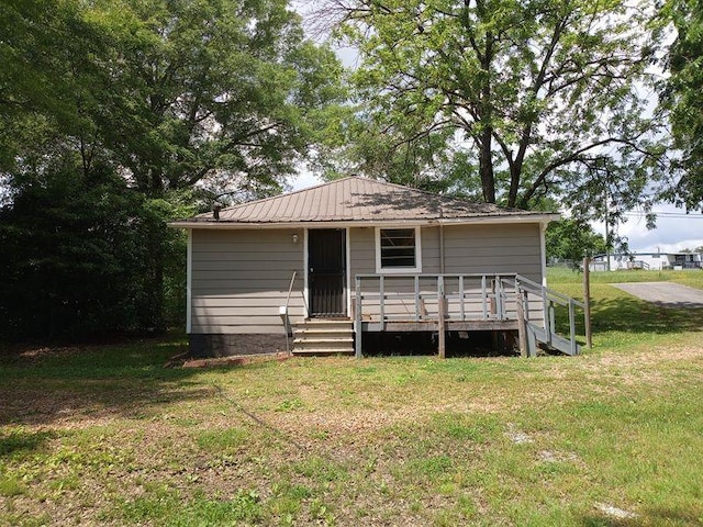2205 Buchanan Hwy, Cedartown, GA 30125 - back of property with a lawn and metal roof
