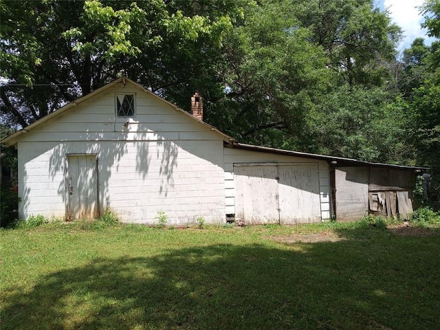 2205 Buchanan Hwy, Cedartown, GA 30125 - view of home's exterior featuring a lawn and a chimney