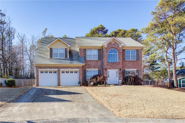 view of front of property with a garage