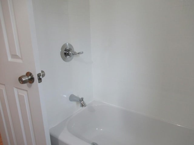 bathroom featuring tub / shower combination