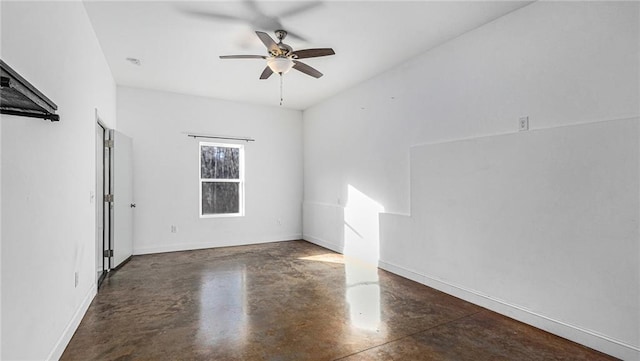 spare room with ceiling fan