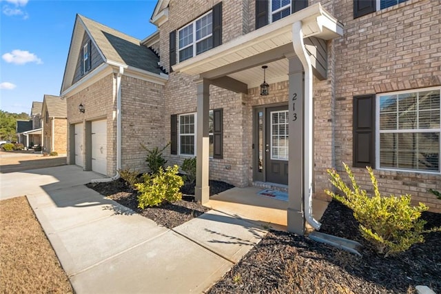 doorway to property featuring a garage