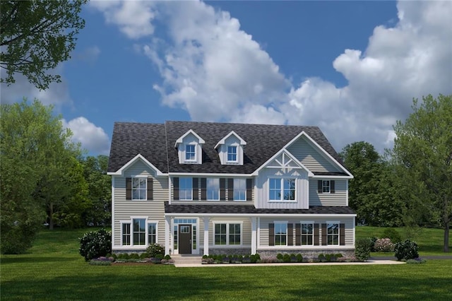 view of front facade featuring a front lawn and a shingled roof