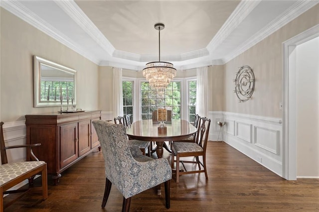 4575 Dairy Way, Peachtree Corners, GA 30092 - dining area with a chandelier, a raised ceiling, dark wood-style flooring, wainscoting, and ornamental molding