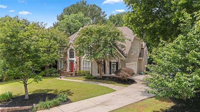 4575 Dairy Way, Peachtree Corners, GA 30092 - view of front of home featuring a front yard, stucco siding, and concrete driveway
