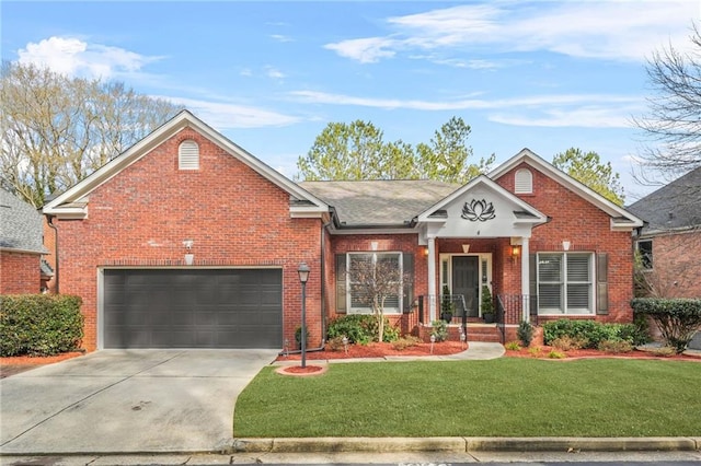 view of front property with a garage and a front yard