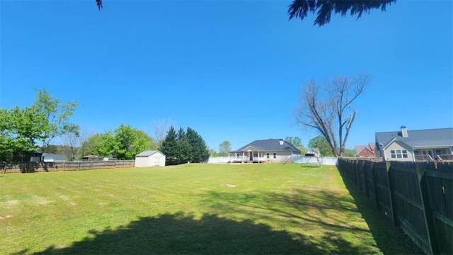 116 Ridge Xing, Temple, GA 30179 - view of yard featuring fence, an outbuilding, and a storage unit
