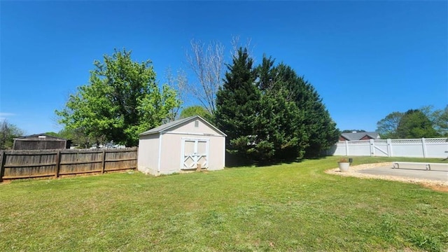 116 Ridge Xing, Temple, GA 30179 - view of yard with a shed, a fenced backyard, and an outdoor structure