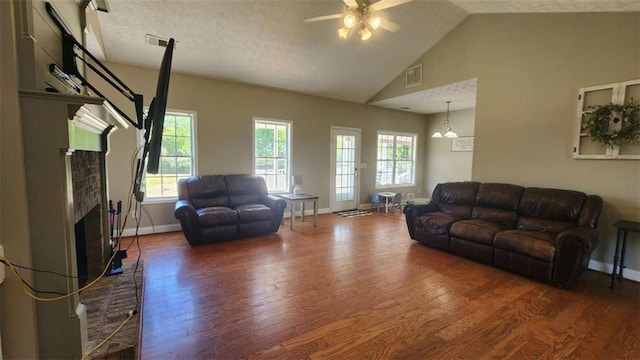 116 Ridge Xing, Temple, GA 30179 - living area featuring a brick fireplace, ceiling fan, baseboards, and wood finished floors