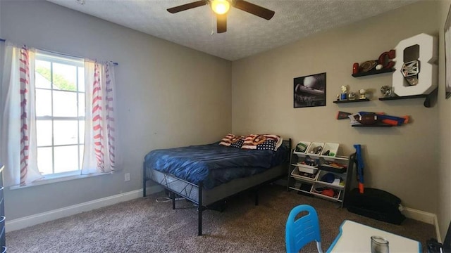 116 Ridge Xing, Temple, GA 30179 - bedroom with baseboards, a ceiling fan, carpet, and a textured ceiling