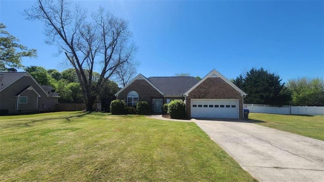 116 Ridge Xing, Temple, GA 30179 - view of front of home featuring driveway, an attached garage, a front yard, brick siding, and fence