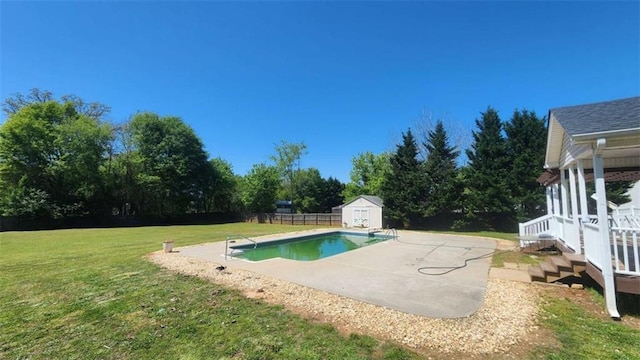 116 Ridge Xing, Temple, GA 30179 - view of swimming pool with a shed, a fenced backyard, an outdoor structure, a lawn, and a patio area