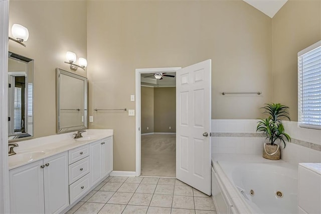 full bathroom with high vaulted ceiling, ceiling fan, a whirlpool tub, tile patterned flooring, and double vanity