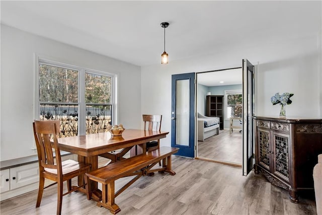 dining room with light wood-type flooring