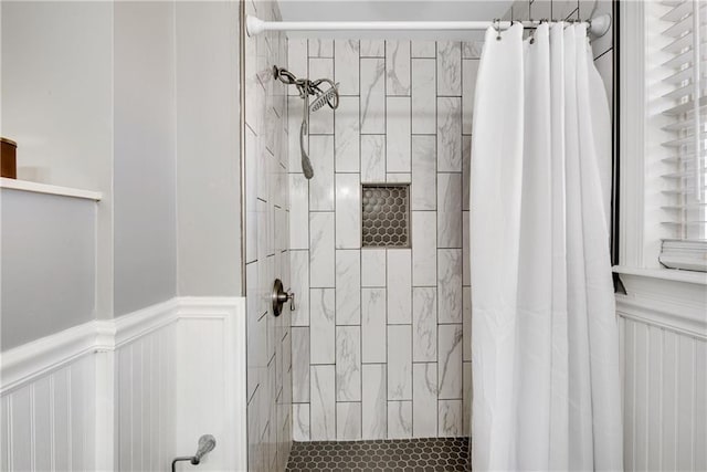 bathroom with a shower with curtain