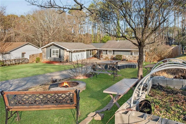 exterior space featuring a fire pit