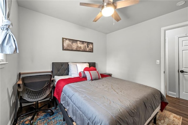 bedroom featuring ceiling fan and wood finished floors