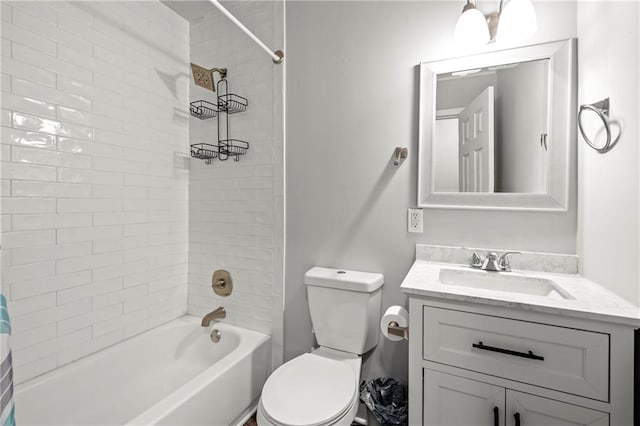 bathroom with shower / bathtub combination with curtain, vanity, and toilet