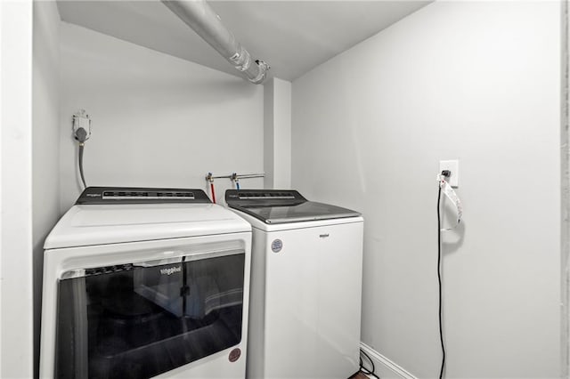 laundry area featuring laundry area and independent washer and dryer