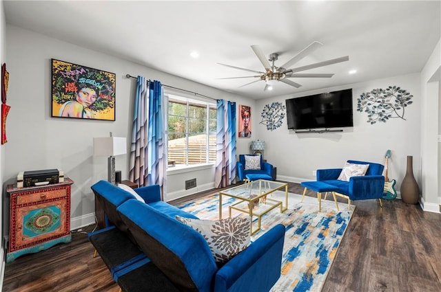 living area with ceiling fan, baseboards, wood finished floors, and recessed lighting