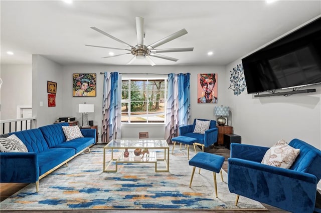 living area with ceiling fan and recessed lighting