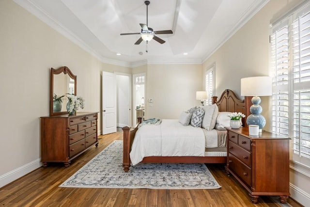 bedroom featuring dark wood-style flooring, multiple windows, crown molding, and baseboards