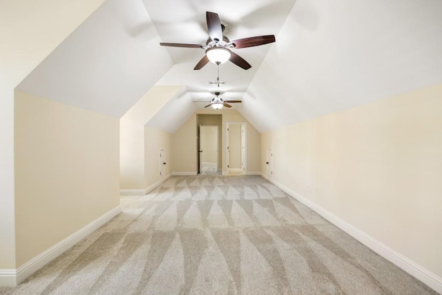 additional living space with lofted ceiling, carpet, and baseboards