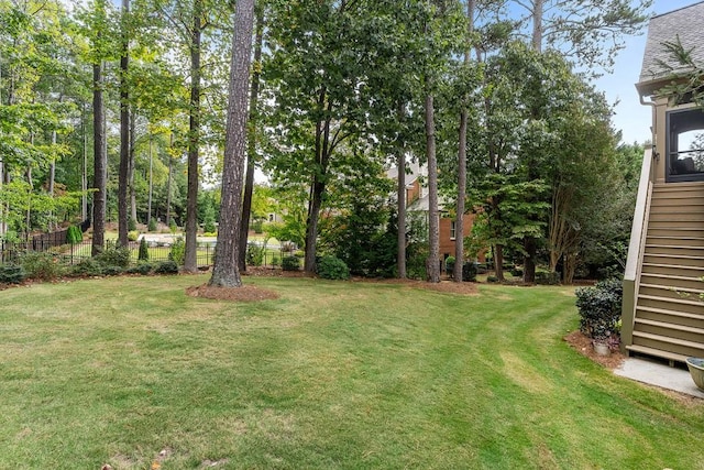 view of yard featuring fence