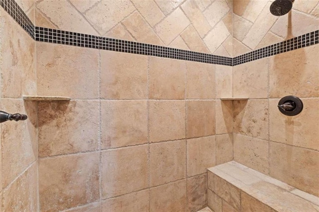 details with a tile shower