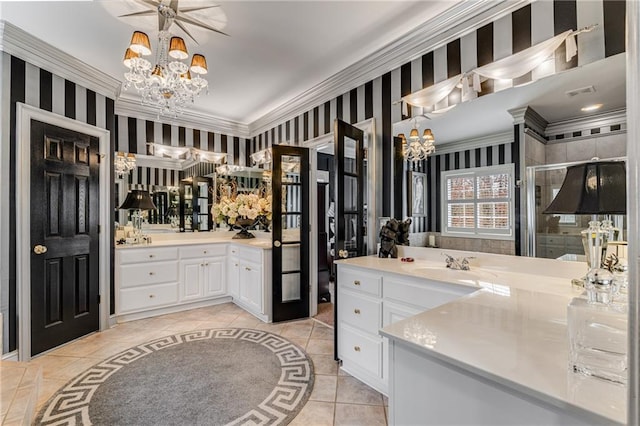 306 Calumet Ln, Monroe, GA 30655 - full bathroom featuring a chandelier, wallpapered walls, tile patterned flooring, a stall shower, and crown molding