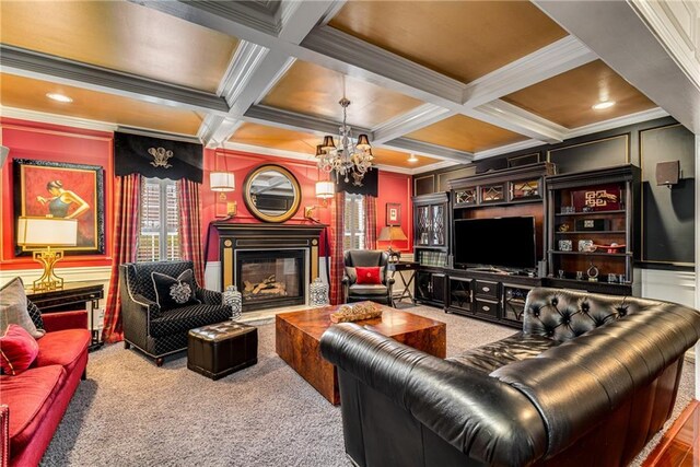 306 Calumet Ln, Monroe, GA 30655 - living area featuring ornamental molding, carpet flooring, a chandelier, beamed ceiling, and coffered ceiling