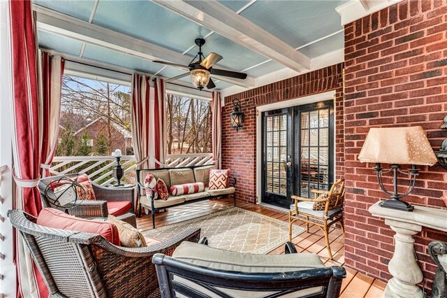 306 Calumet Ln, Monroe, GA 30655 - sunroom / solarium featuring healthy amount of natural light, a ceiling fan, beamed ceiling, and an outdoor living space