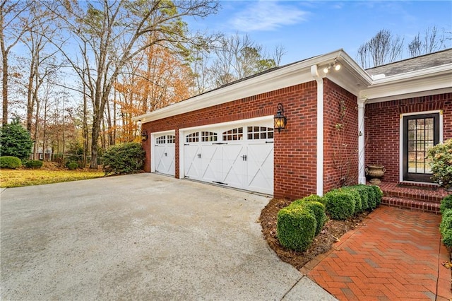 306 Calumet Ln, Monroe, GA 30655 - garage with concrete driveway