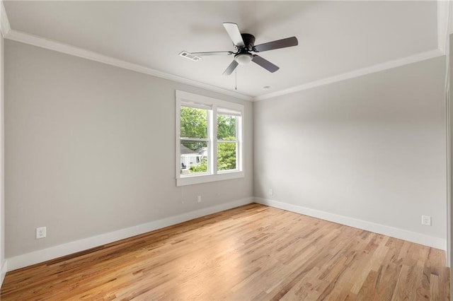 1354 Mcpherson Ave SE, Atlanta, GA 30316 - unfurnished room featuring baseboards, light wood finished floors, crown molding, and ceiling fan