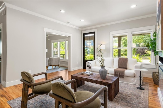 1354 Mcpherson Ave SE, Atlanta, GA 30316 - living area with light wood-style floors, crown molding, baseboards, and recessed lighting