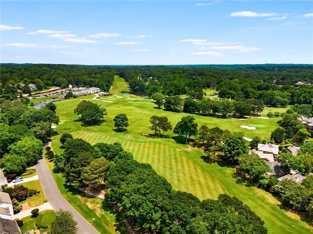 bird's eye view featuring golf course view and a water view