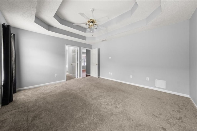 93 Pebble Creek Dr, Newnan, GA 30265 - unfurnished room featuring carpet flooring, a raised ceiling, a ceiling fan, and a textured ceiling