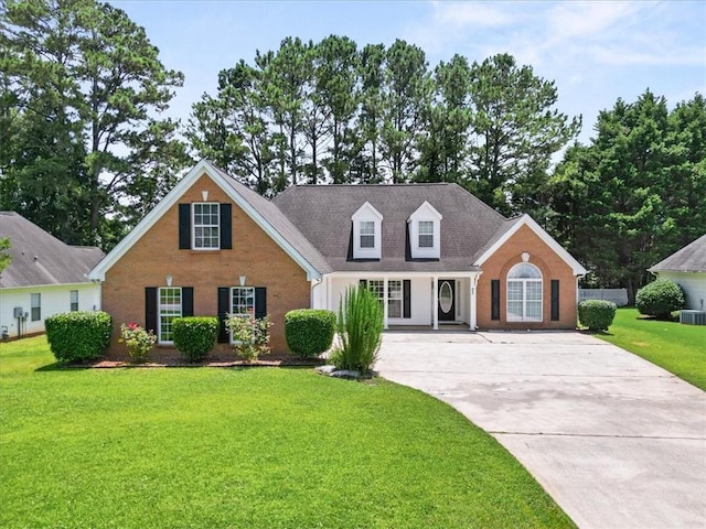 93 Pebble Creek Dr, Newnan, GA 30265 - view of front of house featuring driveway, a front lawn, and brick siding