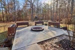 view of patio featuring a fire pit