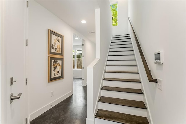 stairway with a wealth of natural light