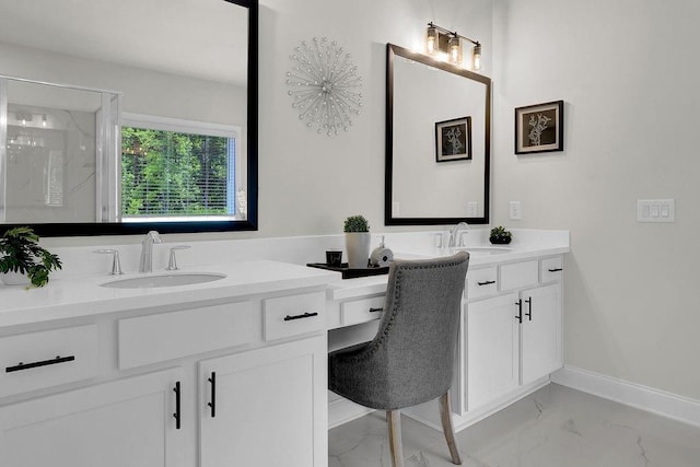 bathroom with walk in shower and vanity