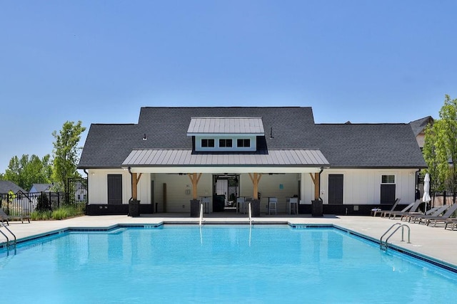 view of swimming pool featuring a patio area