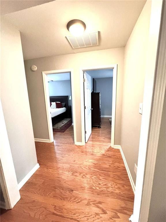 corridor featuring light wood-type flooring