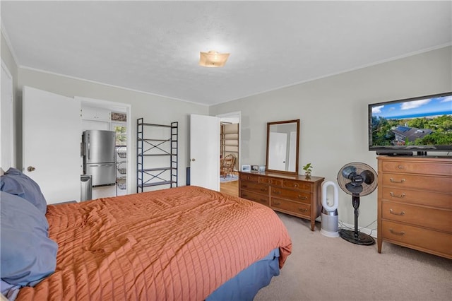 bedroom featuring light colored carpet, freestanding refrigerator, baseboards, and crown molding