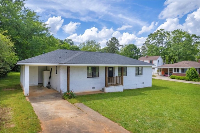 ranch-style house with an attached carport, crawl space, driveway, and a front lawn