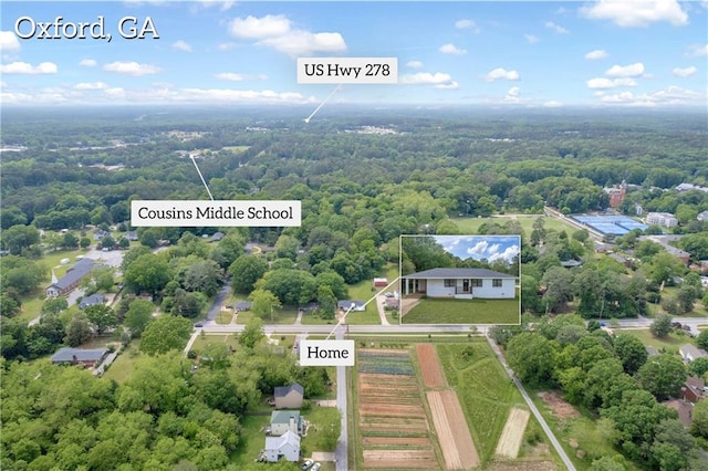 drone / aerial view with a forest view